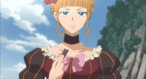 a woman with blonde hair and blue eyes is holding a piece of wood