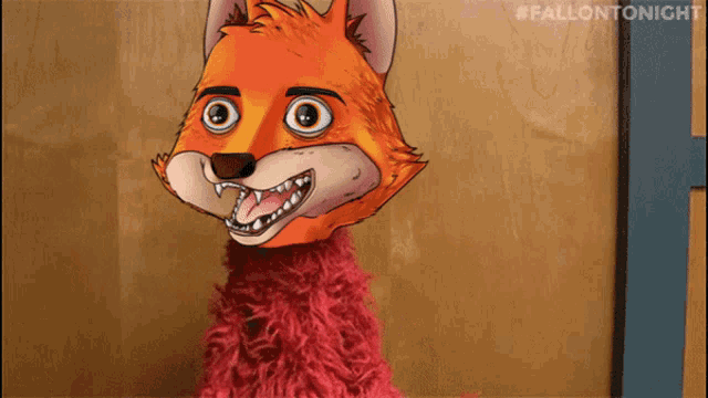a picture of a stuffed animal with a cartoon fox face on it