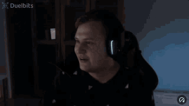a man wearing headphones with duelbits on the bottom