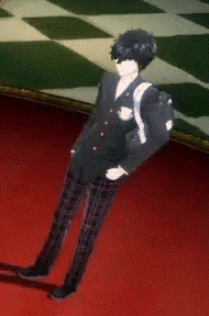a man standing on a red carpet with a backpack on his back