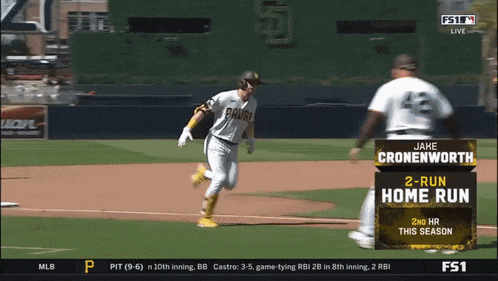 a baseball player named jake cronenworth is running toward home plate