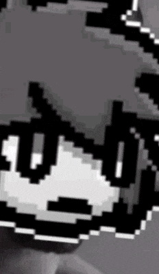 a close up of a pixel art of a person 's face