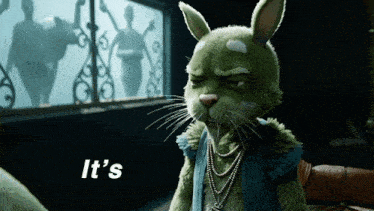 a green rabbit with the words it 's on the bottom right