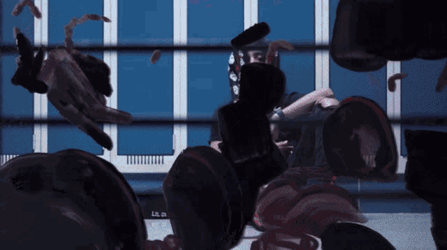 a person in a boxing ring with the word l.a. on the wall