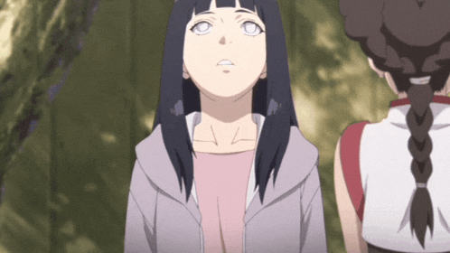 a girl with a braided ponytail is looking up at something
