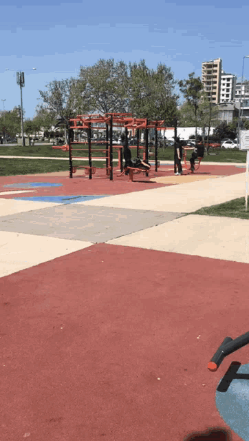 a park with a sign that says ' no smoking ' on it