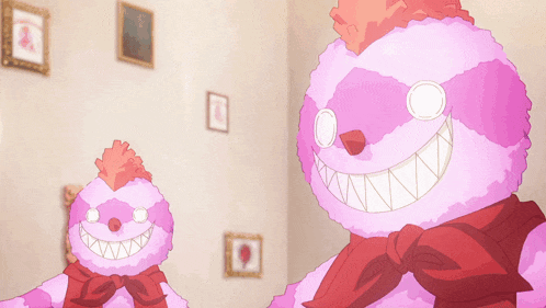 two pink stuffed animals standing next to each other