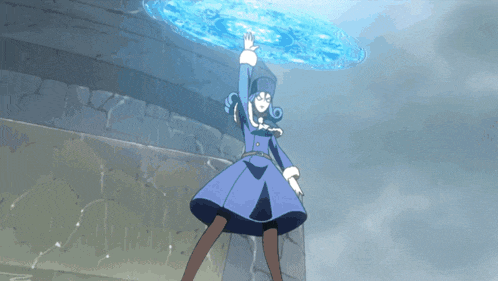 a girl in a blue dress is standing in front of a wall