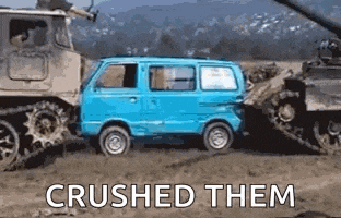 a blue van is being crushed by a tank on a dirt road .