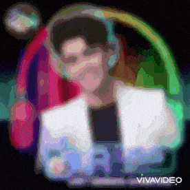 a man wearing headphones is surrounded by a rainbow