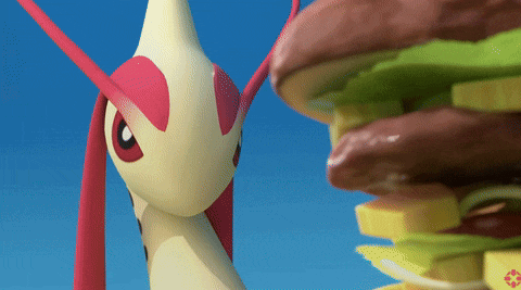a cartoon character is standing next to a stack of sandwiches