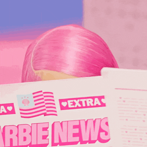 a woman covering her face with a magazine that says extra barbie on it