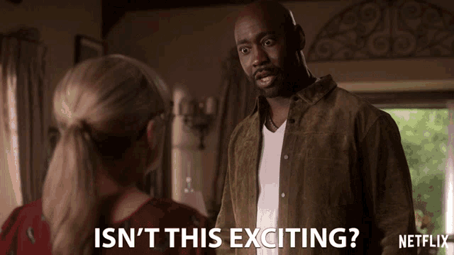 a man talking to a woman with the words isn 't this exciting