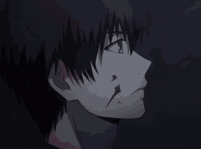 a close up of a person 's face with a bloody spot on it