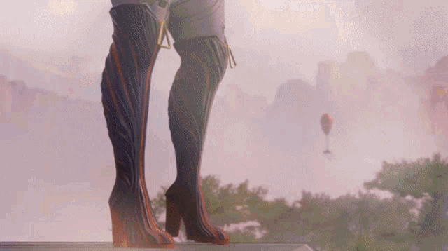 a woman wearing a pair of thigh high boots stands on a balcony