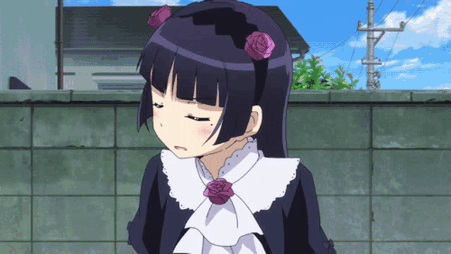 a girl with black hair and a headband with roses on it