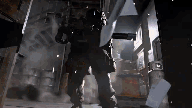 a man in a military uniform is walking through a room