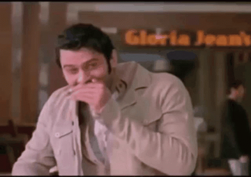 Funny Controlling Laughter GIF - Funny Controlling Laughter Prabhas GIFs