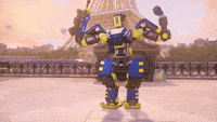 a robot is standing in front of the eiffel tower in paris .