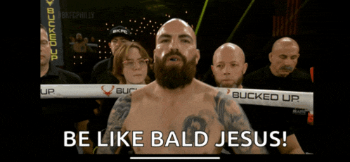 a man in a boxing ring with the words be like bald jesus