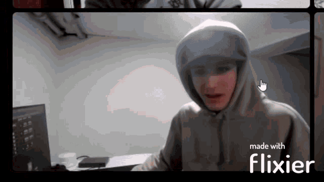 a man in a hoodie is being made with the flixier app