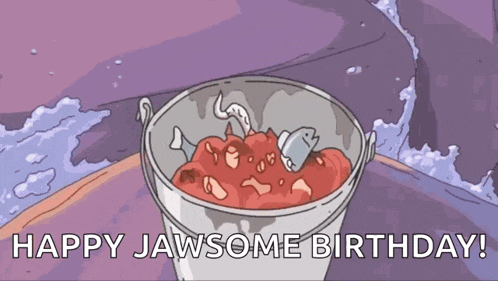a bucket full of fish and meat with the words happy jawsome birthday