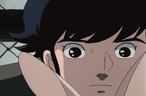 a close up of a cartoon character 's face with a serious look on his face