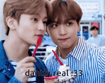 two young men are eating ice cream with straws and the words dantin real : 33 are written on the bottom