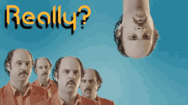 a man with a mustache is hanging upside down with the words really written above him