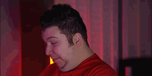 a blurred image of a red light coming out of a window