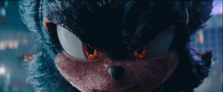 a close up of a sonic the hedgehog with glowing red eyes .