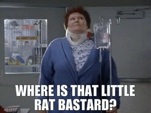 a woman with a neck brace is standing in a hospital room with a caption that says where is that little rat bastard