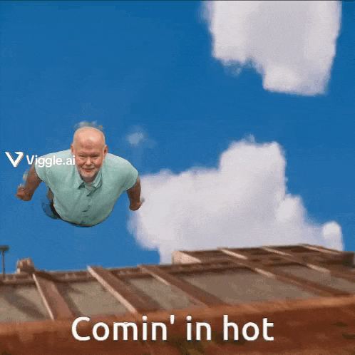 a man is flying through the air with the words comin ' in hot behind him