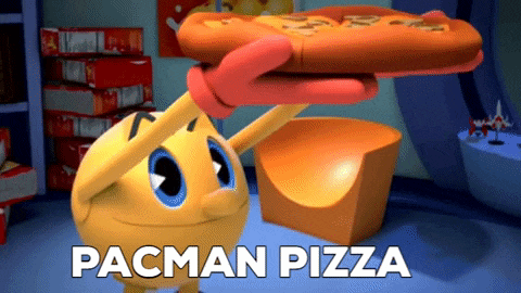 pacman is holding a pizza in his hands and says pacman pizza