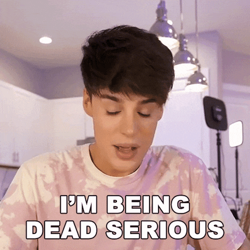 a young man in a pink tie dye shirt says i 'm being dead serious