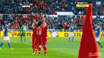 a soccer game is being played on a sports tv channel