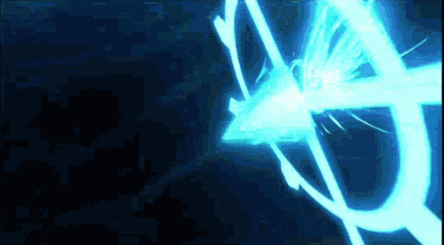 a blue light is coming out of a circle in the dark .