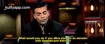 a man in a suit is asking what would you do if you were stuck in an elevator with deepika and katrina ..