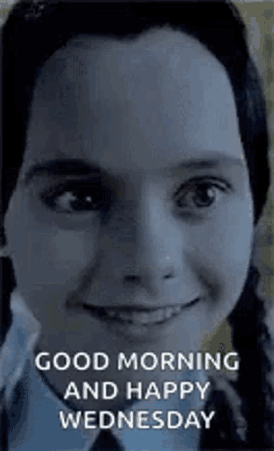 good morning and happy wednesday is written on a picture of a girl .