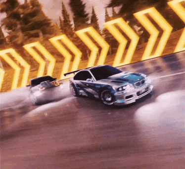 two cars are racing on a track and one has a bmw logo on the front
