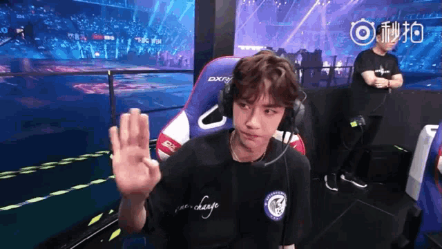 a man wearing headphones and a shirt that says chicago waves