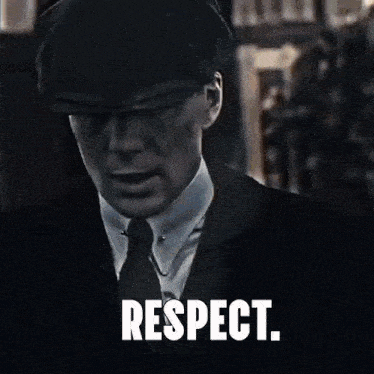 a man in a suit and hat is saying respect .