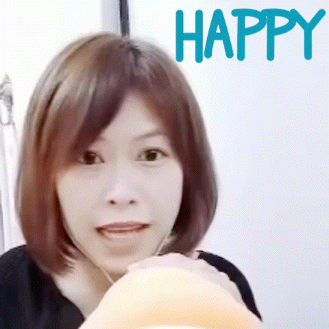 a woman 's face is shown with the word happy behind her