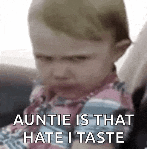 a baby is making a funny face and saying `` auntie is that hate i taste ''