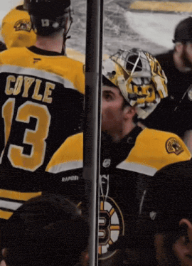 a hockey player with the number 13 on their jersey