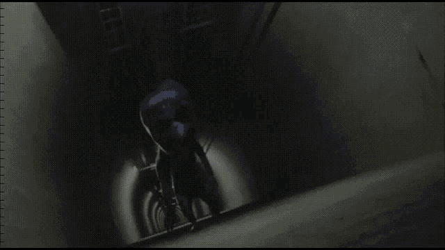 a person is looking down a dark tunnel with a light coming out of it