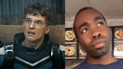 a man in a space suit and a man in a blue shirt are looking up at something .