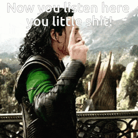 a man in a green shirt and black jacket is making a funny face and says now you listen here you little shit !