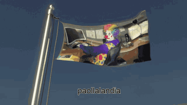 a flag with a picture of a clown sitting at a desk and the words paollalandia below it