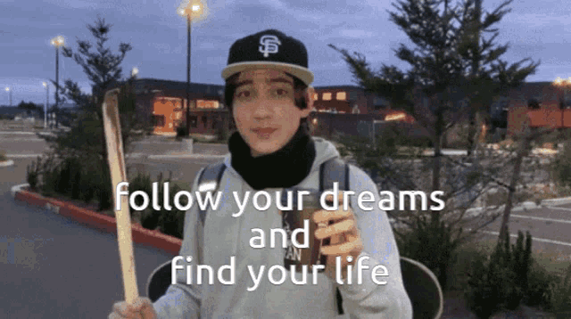 a young man holding a baseball bat with the words follow your dreams and find your life